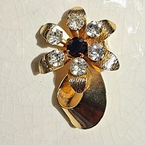 60s Flower Starburst 6 cubic zirconia  black faceted stone w/unique loop brooch